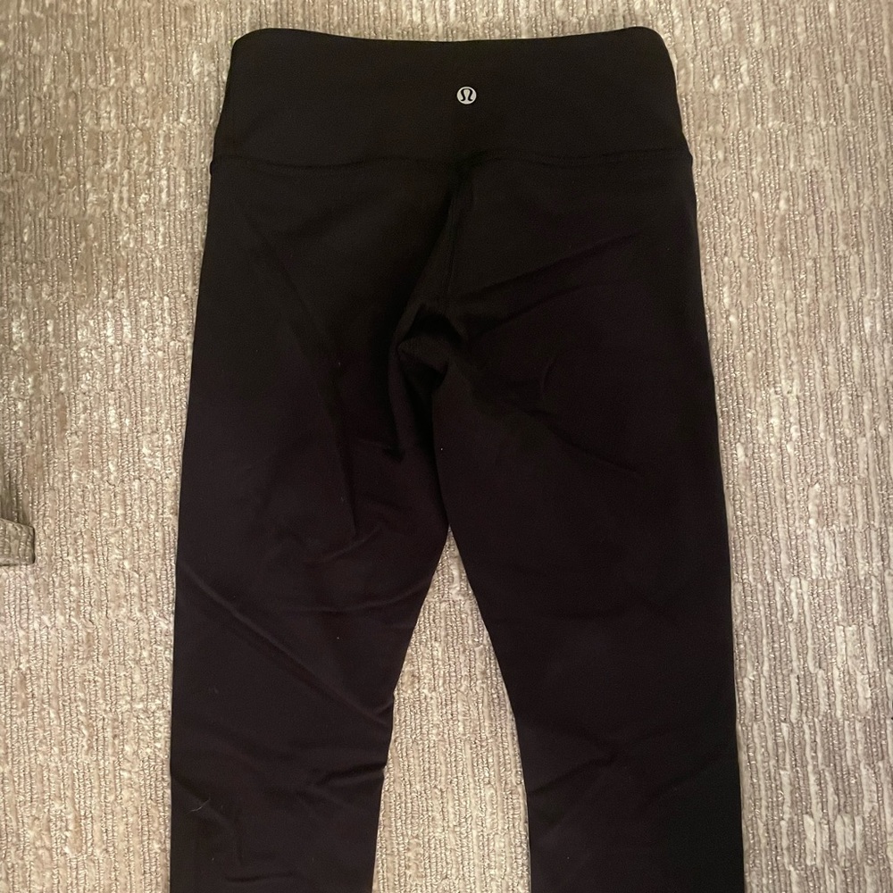 Lululemon black wonder under leggings. Size 4